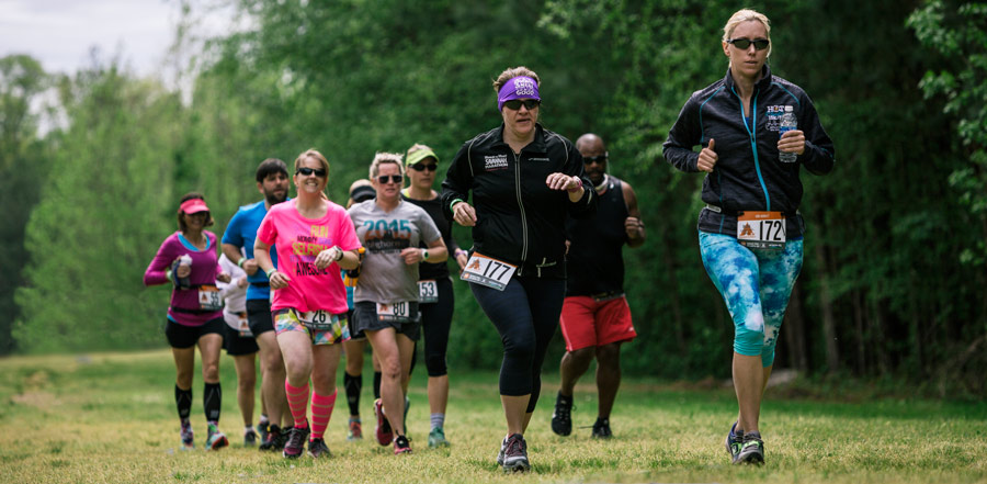 a crowd of ragnar trail running relay participants running