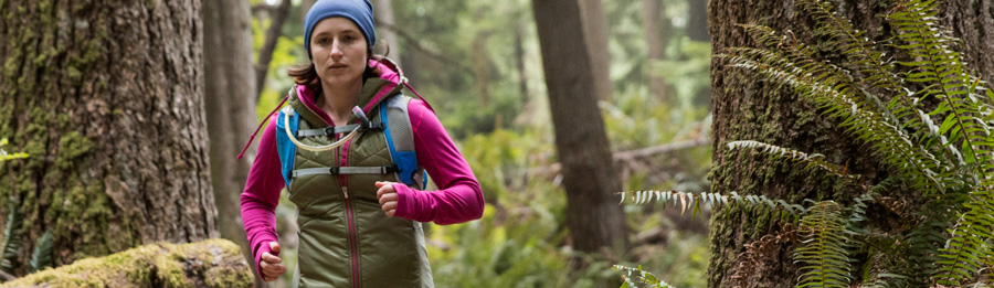 a trail runner wearing a hydration pack