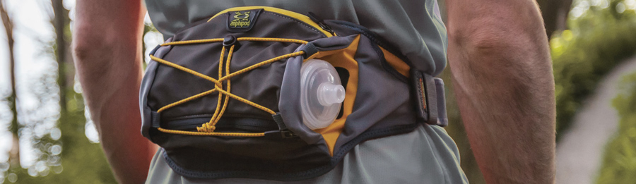 a hiker wearing a hydration waistpack
