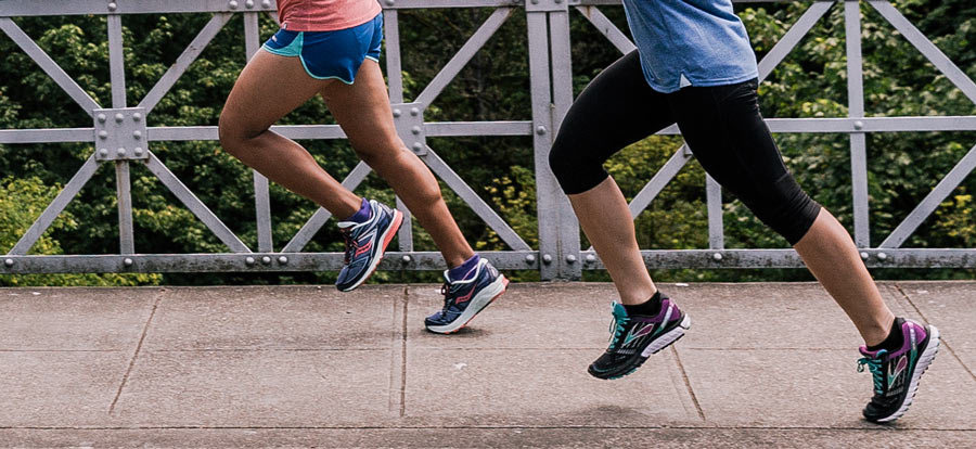 the legs of two runners