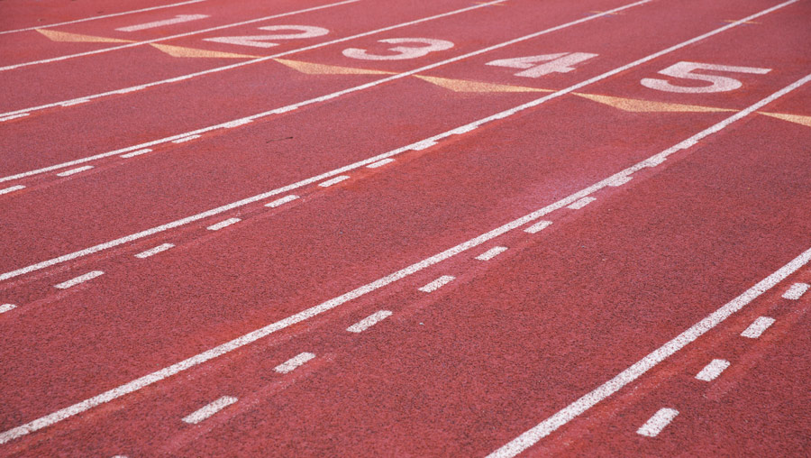 the surface of a running track