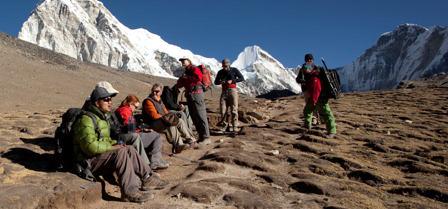 fitnessinf Expert Advice - How to Identify and Treat Altitude Sickness - a group of hikers taking a rest on a high elevation hike