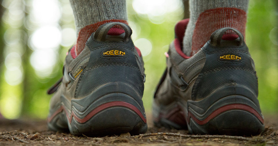 a hikers heels on the trail