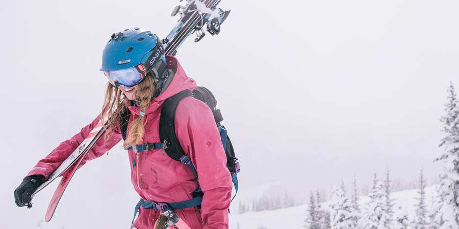 a skiier wearing a snowsports backpack