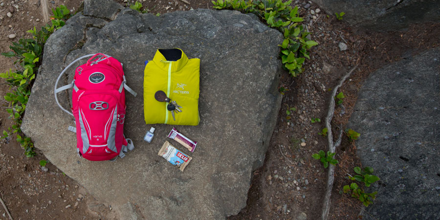 a spread of gear that would fit in a daypack with capacity of 10 liters or less 